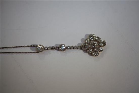 An Edwardian silver and gold, diamond cluster drop pendant, pendant 60mm.